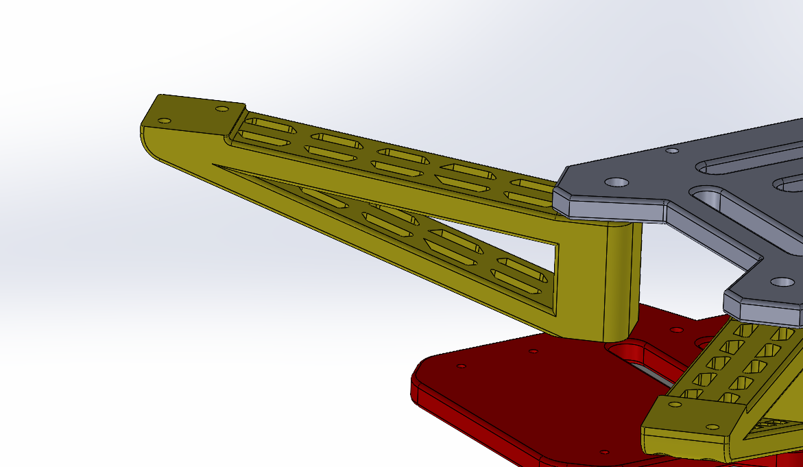 SolidWorks render of the redesigned drone motor arm: an olive-coloured arm with rows of lightening slots along its web and a triangulated truss at the root, bolted through a grey plate to a red baseplate.